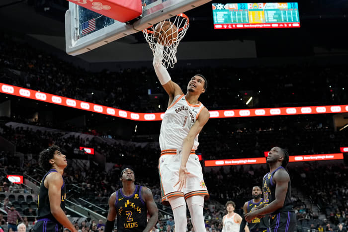 Dec 15, 2023; San Antonio, Texas, USA; San Antonio Spurs forward Victor Wembanyama (1) dunks during the first half against the Los Angeles Lakers at Frost Bank Center.
